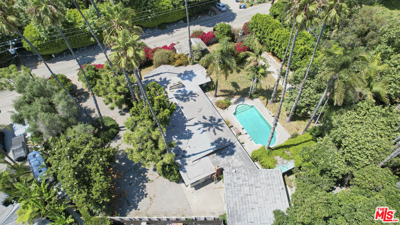 6414 Bonsall Drive Malibu, CA 90265 - Photo 58 of 75 an aerial view of a house with a yard and lake view