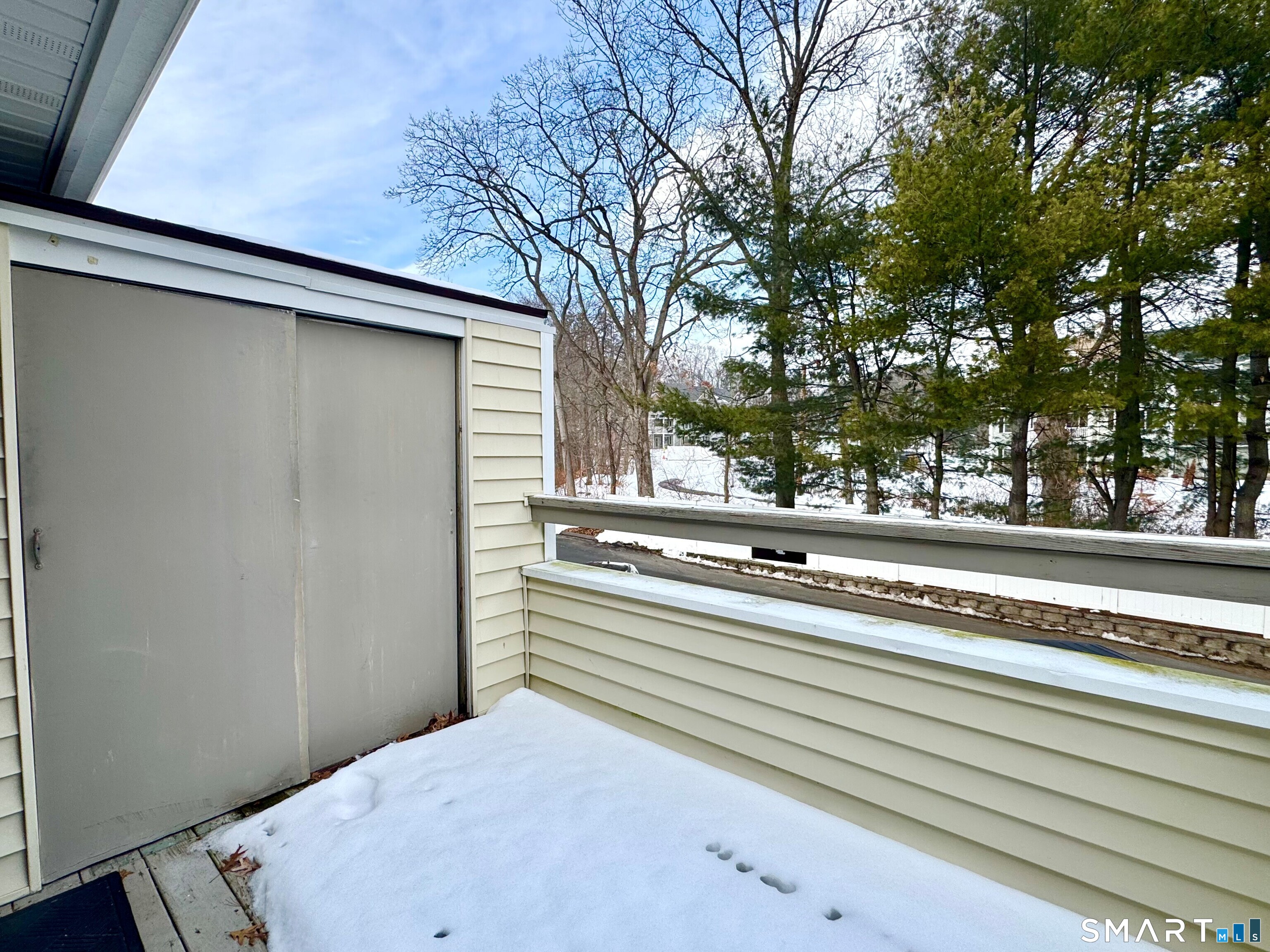 357 East Mitchell Avenue, Unit 357 Cheshire, CT 06410 - Photo 16 of 19 Deck with storage shed