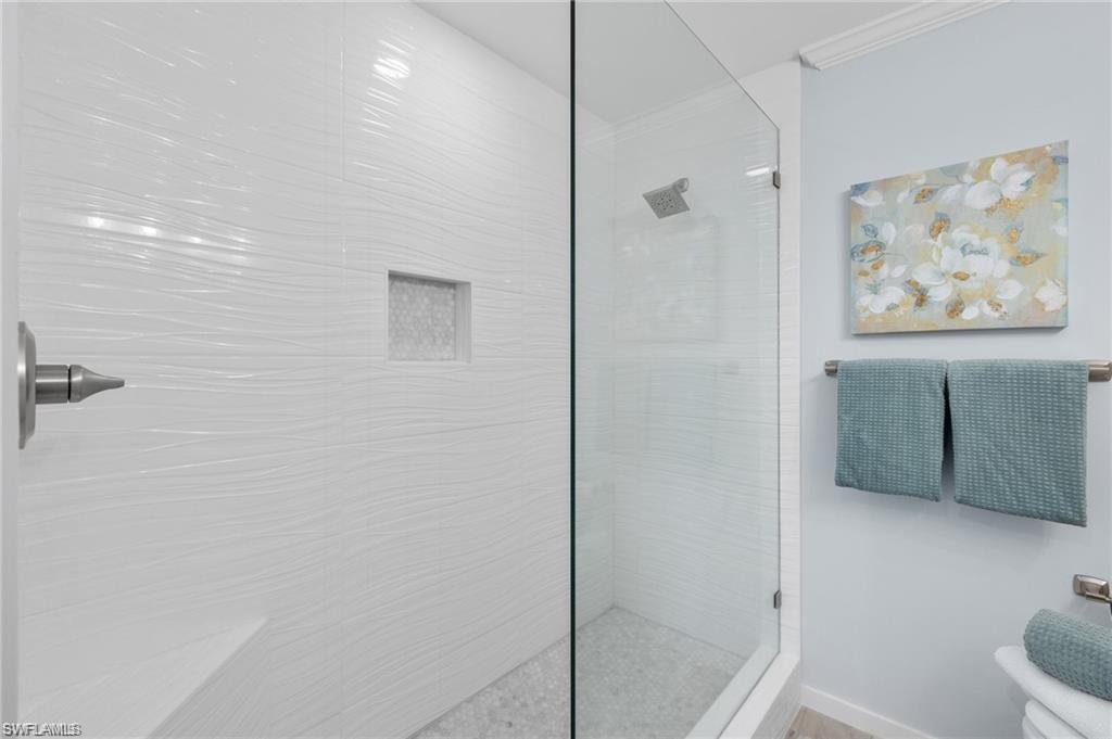 1435 Curlew Avenue, Unit 3 Naples, FL 34102 - Photo 11 of 28 a bathroom with a shower and a toilet