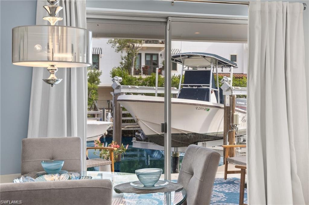 1435 Curlew Avenue, Unit 3 Naples, FL 34102 - Photo 15 of 28 a living room filled with furniture