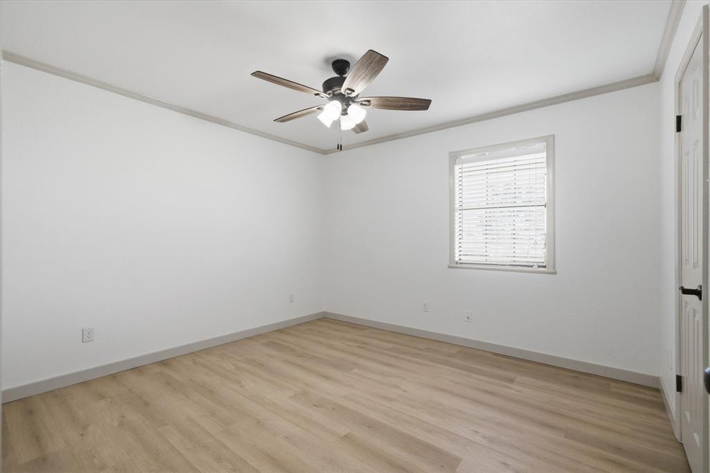3360 Fm 1805 Van, TX 75790 - Photo 20 of 40 wooden floor in an empty room with a window