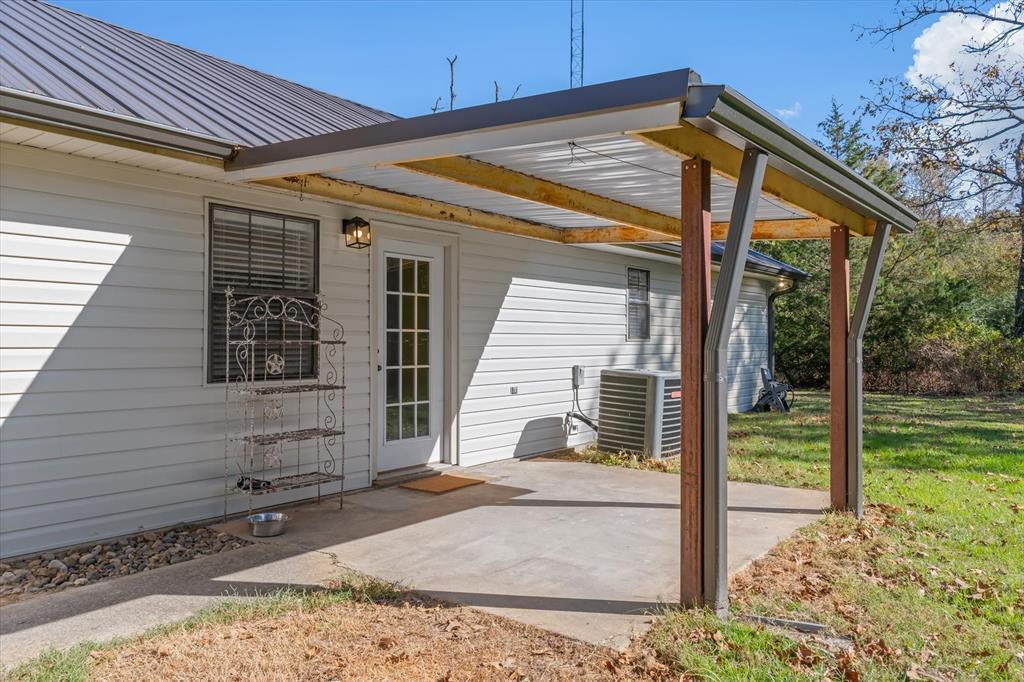 3360 Fm 1805 Van, TX 75790 - Photo 29 of 40 a front view of a house with a garden