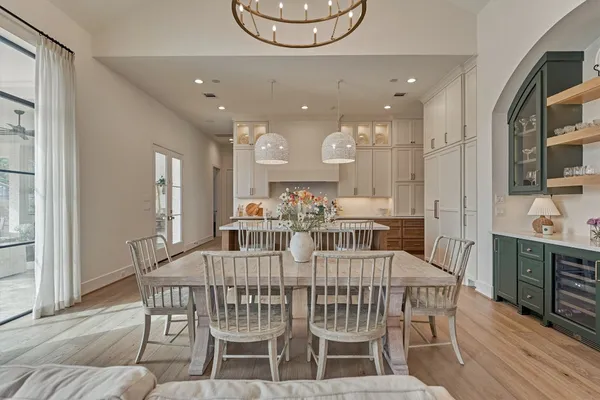 a kitchen with stainless steel appliances granite countertop a sink and cabinets