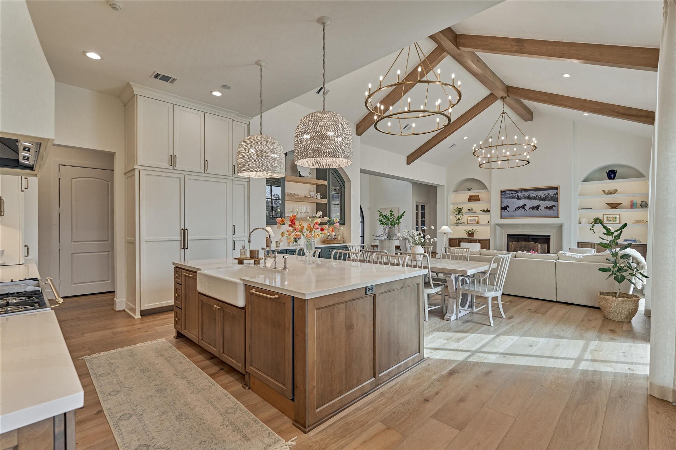 7715 Morgans Pond Court Spring, TX 77389 - Photo 14 of 50 Bright and open-concept chef’s kitchen is the heart of the home that flows with the indoor and outdoor living spaces.