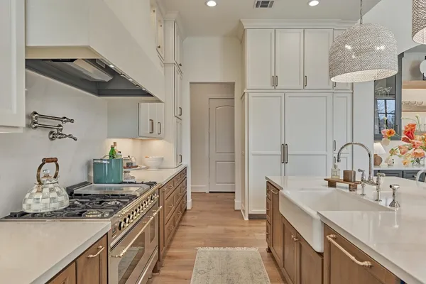 a view with kitchen cabinets and window