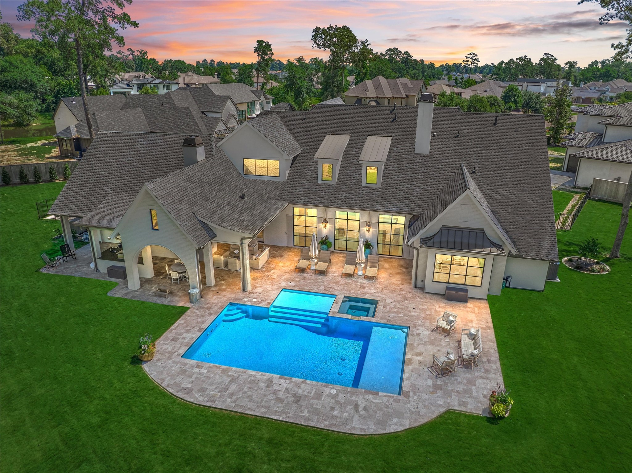 7715 Morgans Pond Court Spring, TX 77389 - Photo 2 of 50 Elevated living and seamless entertaining with every luxury element. Photo is virtually staged/enhanced.