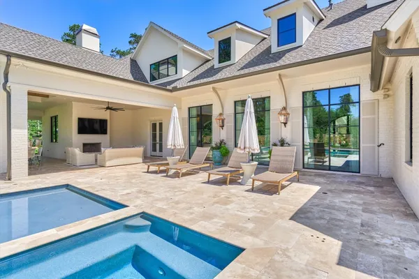 a dining room with furniture and garden view