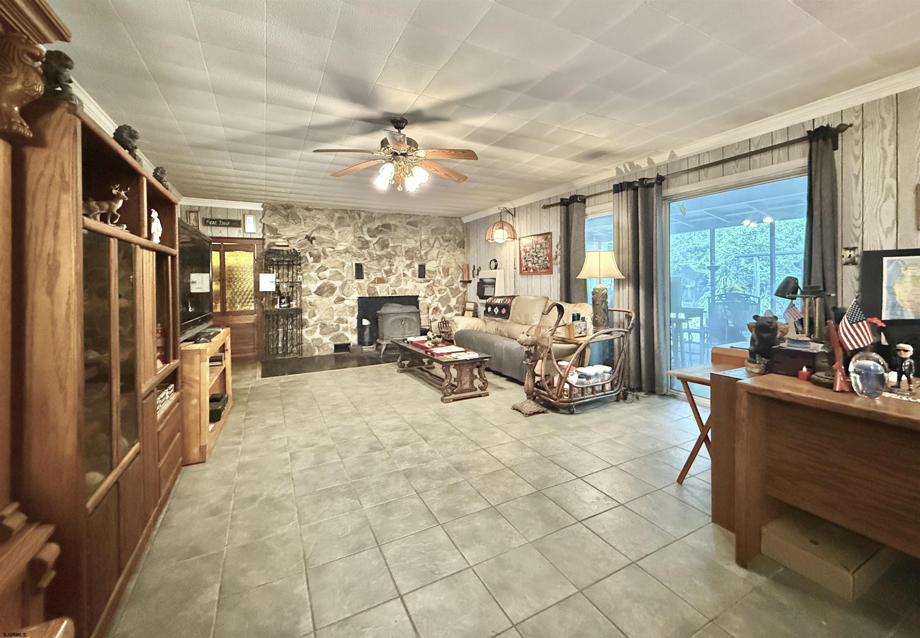 506 Hagan Road Cape May Court House, NJ 08210 - Photo 22 of 45 a view of a livingroom with furniture and a large window