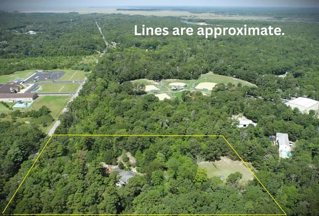 a view of a house with a street