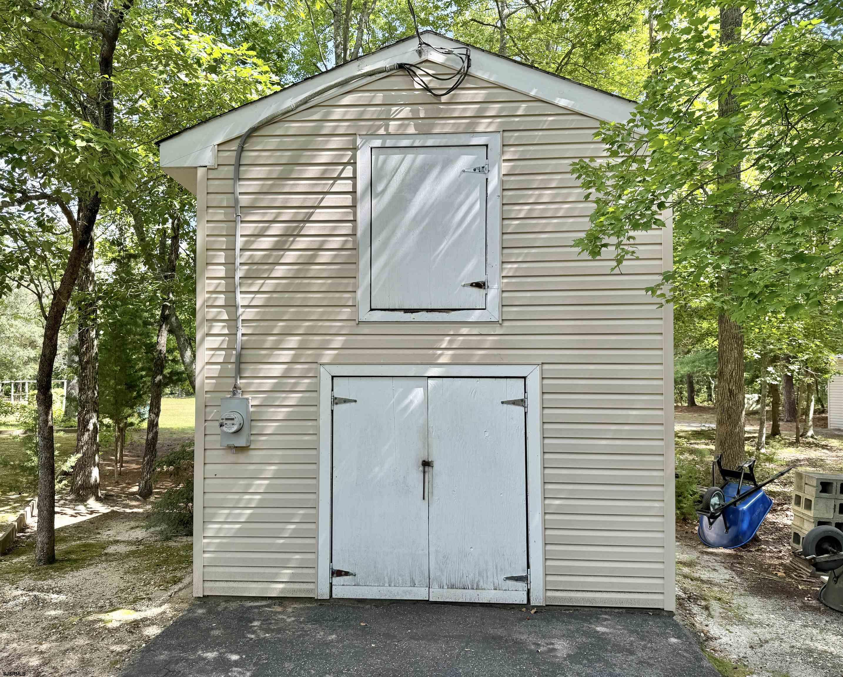 506 Hagan Road Cape May Court House, NJ 08210 - Photo 41 of 45 a view of a small house with yard