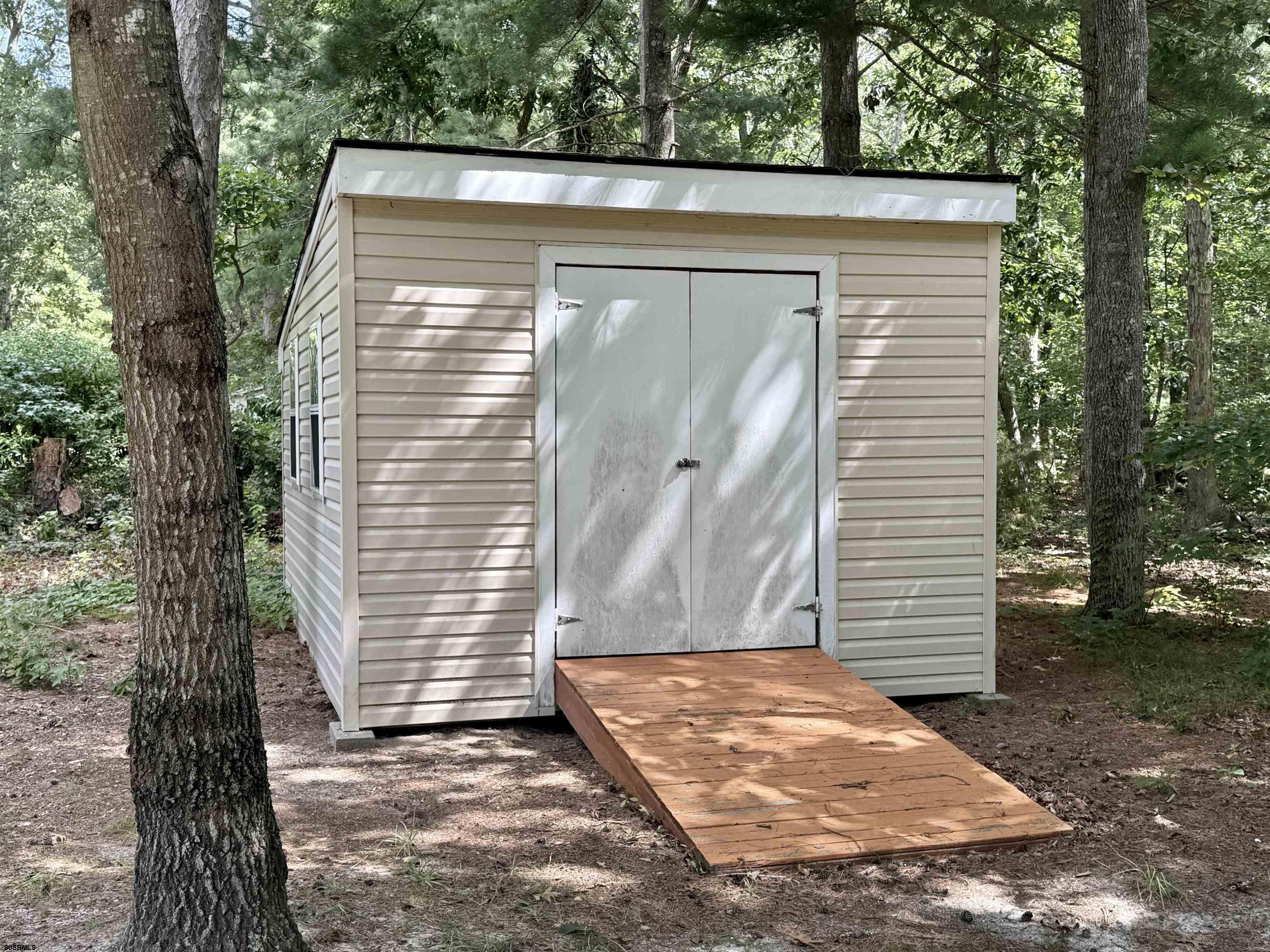 506 Hagan Road Cape May Court House, NJ 08210 - Photo 45 of 45 a view of a house with a small yard