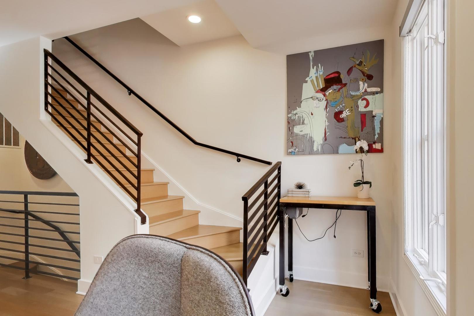 1137 West Monroe Street, Unit 9 Chicago, IL 60607 - Photo 12 of 31 a view of entryway with stairs and furniture