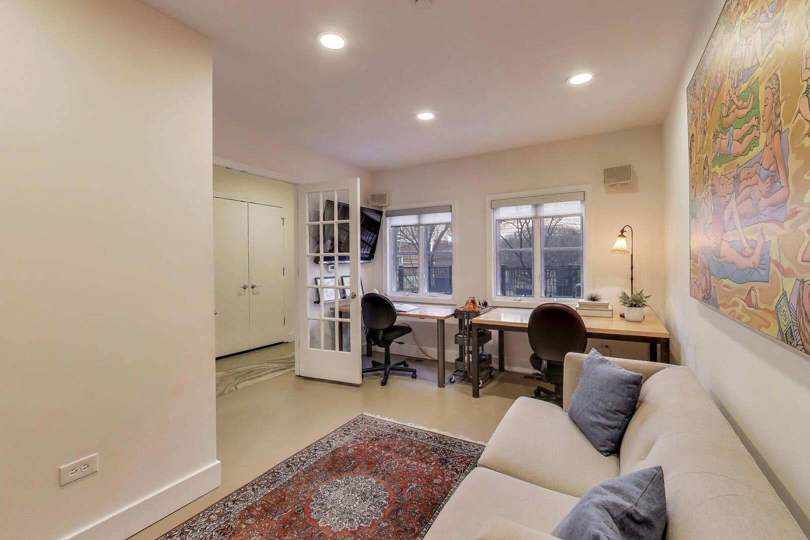 1137 West Monroe Street, Unit 9 Chicago, IL 60607 - Photo 29 of 31 a living room with furniture and a large window