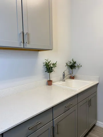 a bathroom with a sink and vanity
