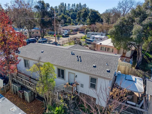a aerial view of a house with a garden and plants