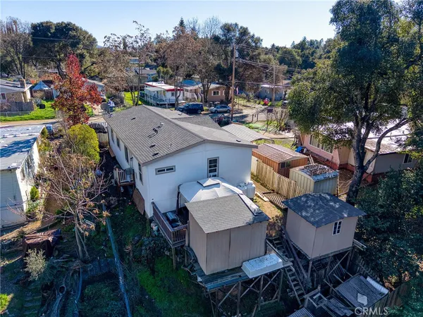 a view of a chairs and table in patio