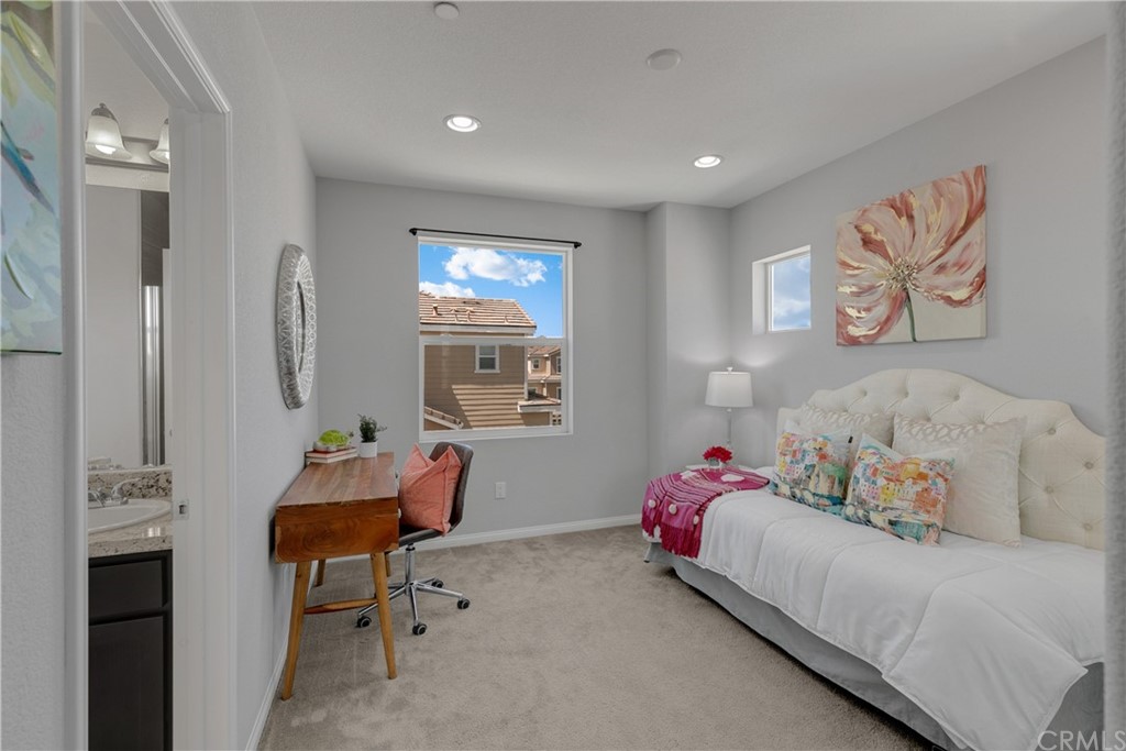 9016 Kimberly Ln. Cypress, CA 90630 - Photo 12 of 21 a bedroom with furniture and a bed