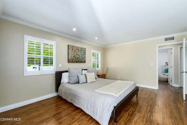a bathroom with a sink double vanity and a shower