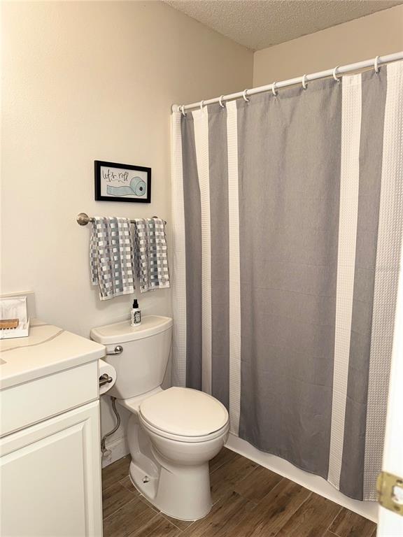 1550 South Belcher Road, Unit 335 Clearwater, FL 33764 - Photo 13 of 21 a bathroom with a toilet a sink and a shower