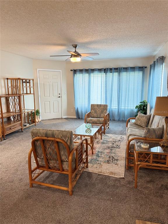 1550 South Belcher Road, Unit 335 Clearwater, FL 33764 - Photo 3 of 21 a living room with furniture