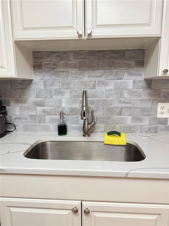 1550 South Belcher Road, Unit 335 Clearwater, FL 33764 - Photo 5 of 21 a close view of sink and tap