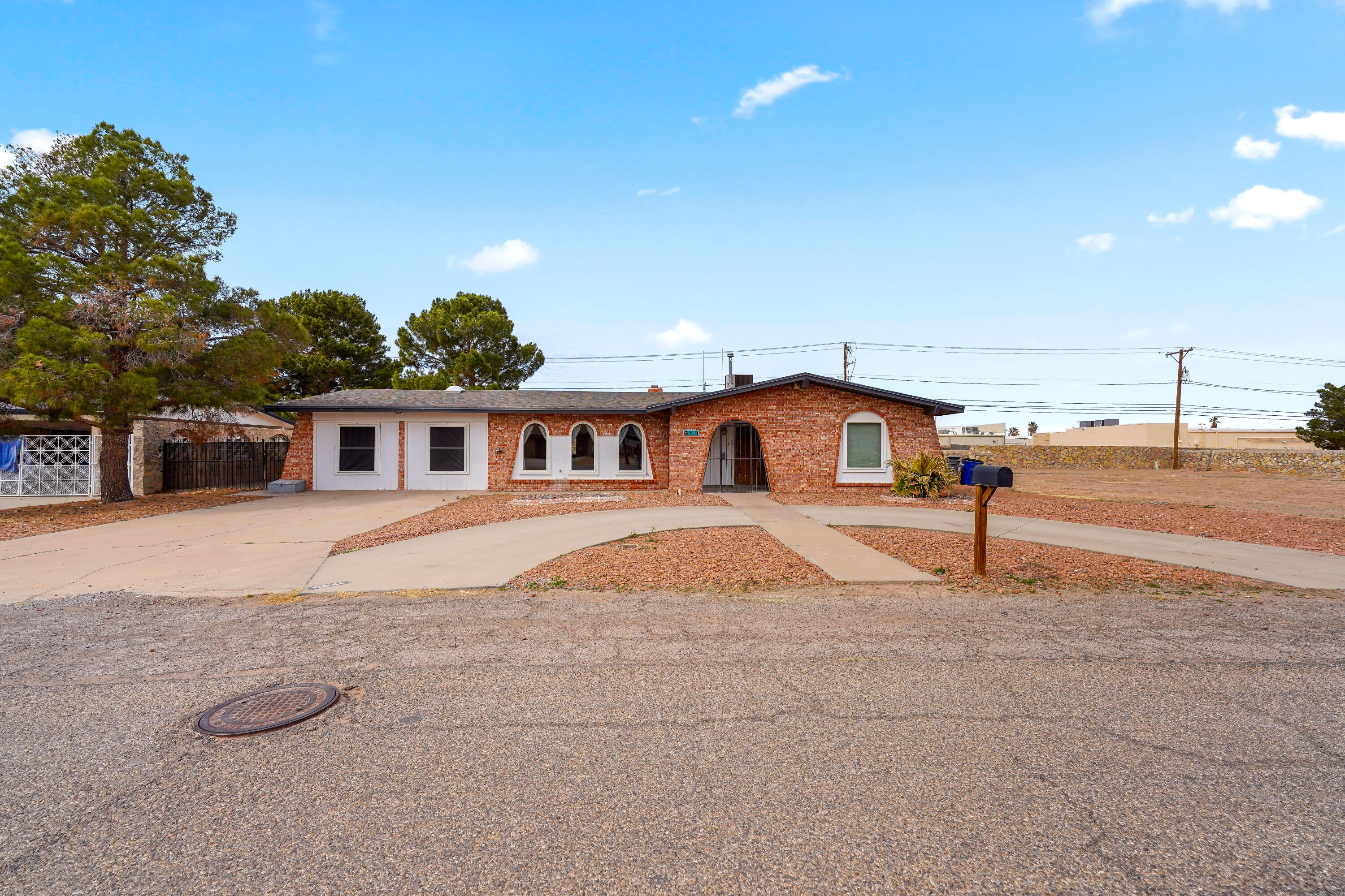 9041 Coventry Circle El Paso, TX 79907 - Photo 1 of 1 a front view of a house with a yard