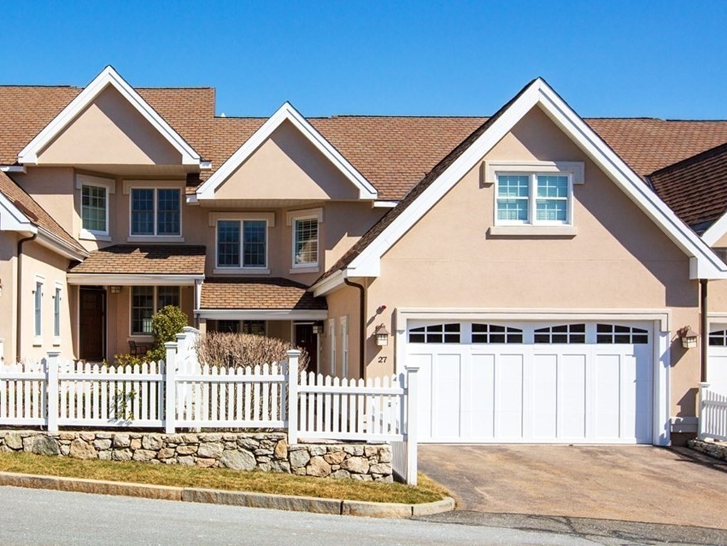 a front view of a house with a porch