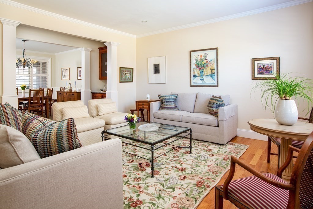 287 Langley Road, Unit 27 Newton, MA 02459 - Photo 3 of 17 a living room with furniture and wooden floor