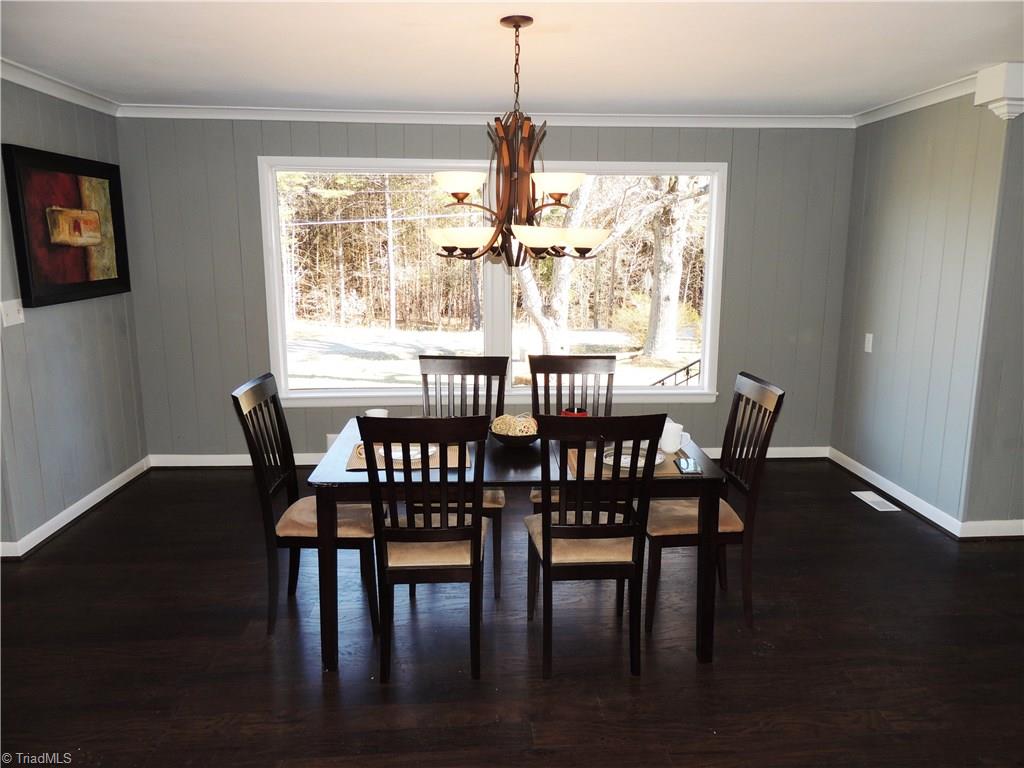 4017 Resthaven Road High Point, NC 27265 - Photo 12 of 29 Spacious dining room! Great space for entertaining! Fantastic views from the large windows!