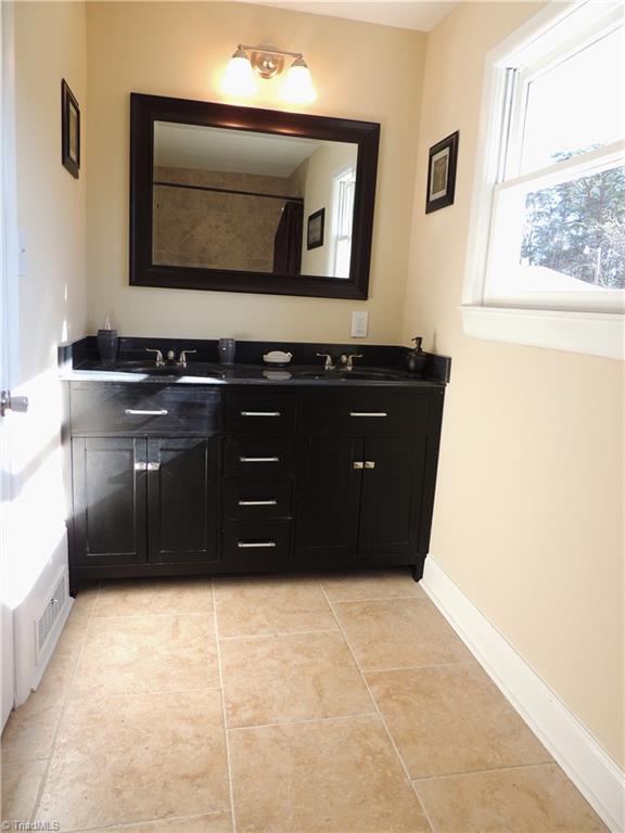 4017 Resthaven Road High Point, NC 27265 - Photo 19 of 29 Master bath features large vanity with dual sinks!