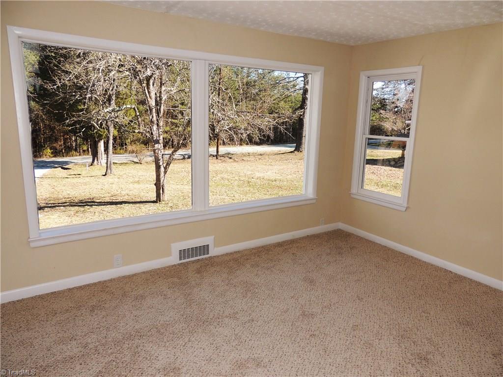 4017 Resthaven Road High Point, NC 27265 - Photo 20 of 29 A very sunny bedroom also features large windows and plush carpeting!