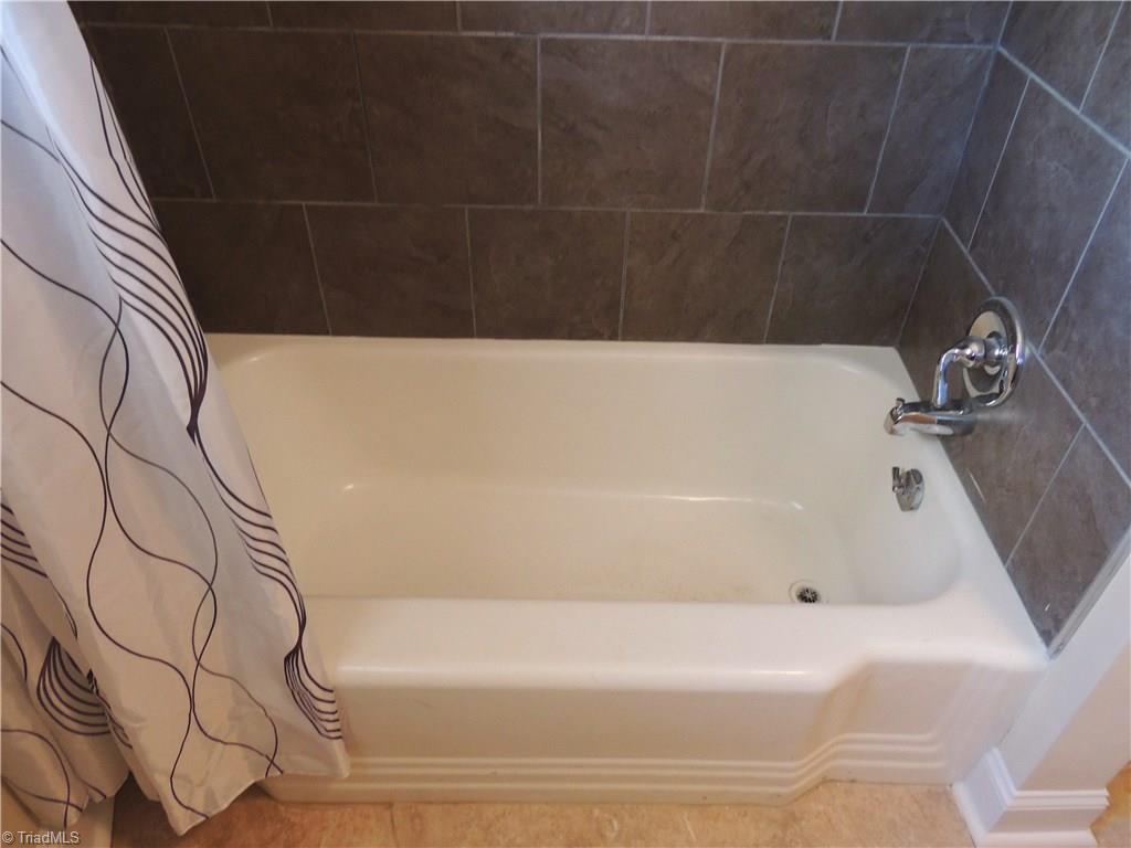 4017 Resthaven Road High Point, NC 27265 - Photo 21 of 29 A second full bath, also with tile surround!