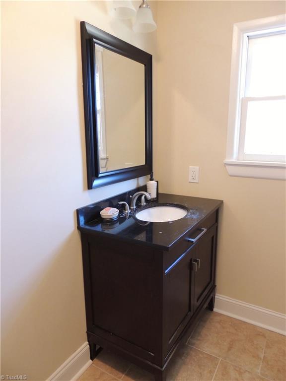 4017 Resthaven Road High Point, NC 27265 - Photo 22 of 29 Nice vanity in the second bath!