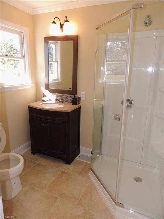 4017 Resthaven Road High Point, NC 27265 - Photo 23 of 29 Third full bath features a shower and crown molding!