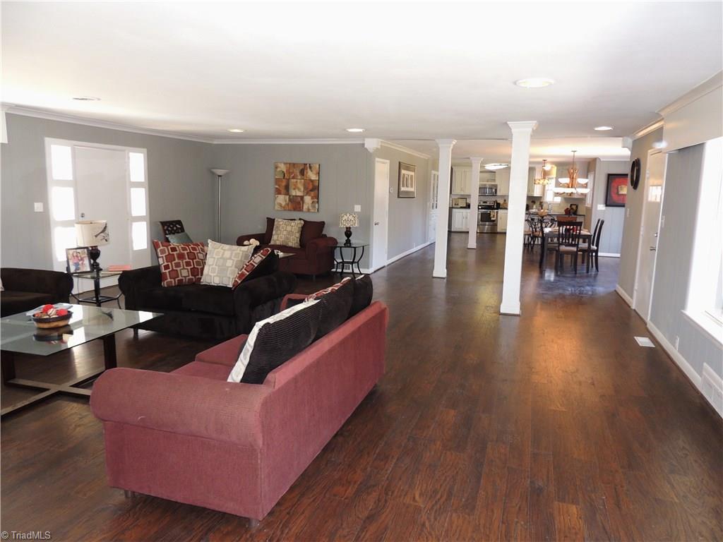 4017 Resthaven Road High Point, NC 27265 - Photo 8 of 29 Wide Open Spaces!! Great room is flanked by large windows on each side and opens to the dining room!