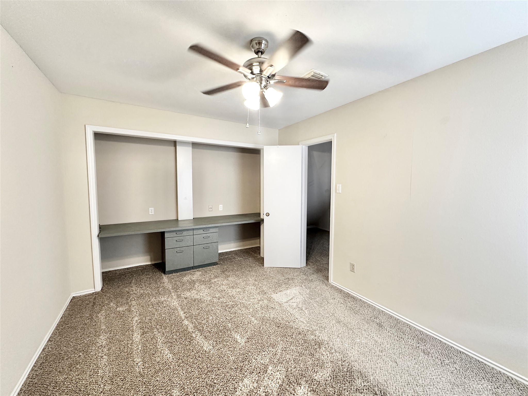 16827 Ashbridge Court Spring, TX 77379 - Photo 16 of 20 a view of an empty room with a window