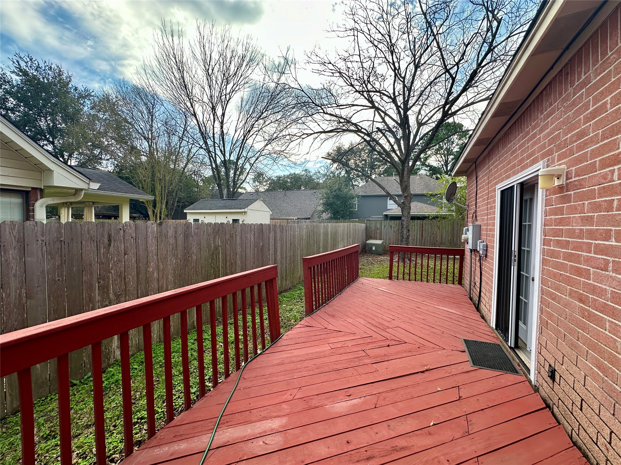 16827 Ashbridge Court Spring, TX 77379 - Photo 19 of 20 a view of balcony with wooden floor and outdoor seating