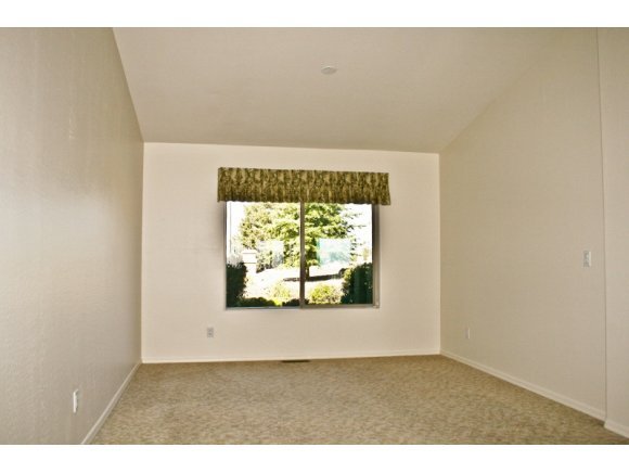 491 Miracle Rider Road Prescott, AZ 86301 - Photo 7 of 20 a view of an empty room with a window