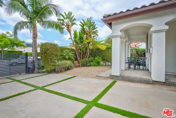 a view of a backyard with a patio