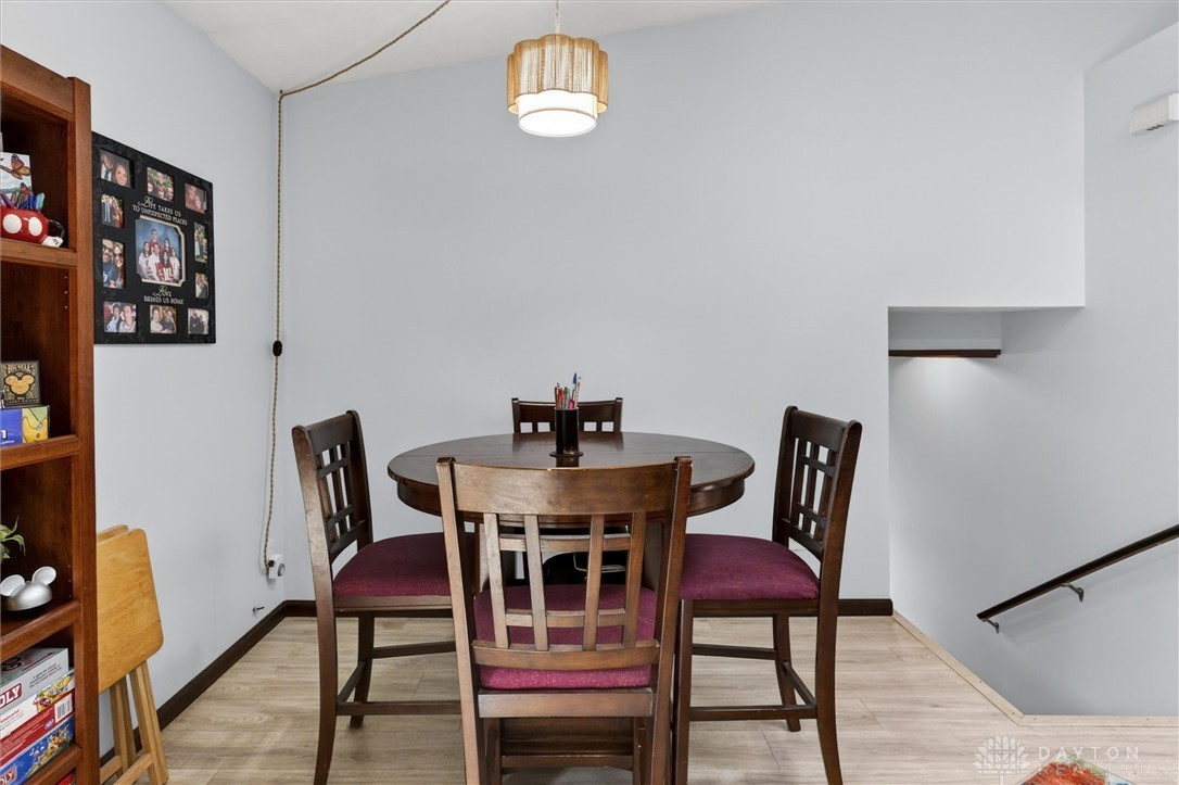 2165 Stewart Road Xenia, OH 45385 - Photo 17 of 59 This inviting dining area features a warm ambiance, perfect for casual meals or entertaining guests.
