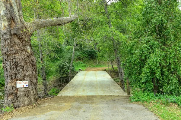 a view of backyard with green space