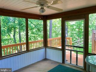 950 Riversedge Circle Annapolis, MD 21401 - Photo 4 of 32 REAR SCREENED IN PORCH BACKING TO WOODS