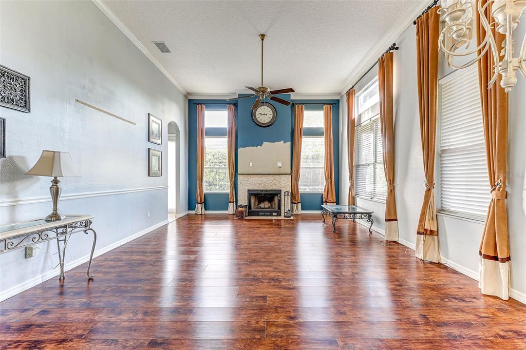 918 Algare Loop Windermere, FL 34786 - Photo 17 of 73 a view of an empty room with wooden floor and a window
