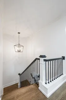 an aerial view of house with yard swimming pool and outdoor seating