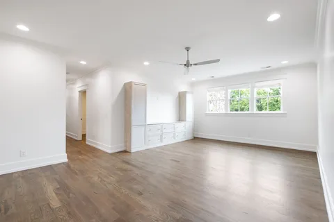 an aerial view of a house with a garden