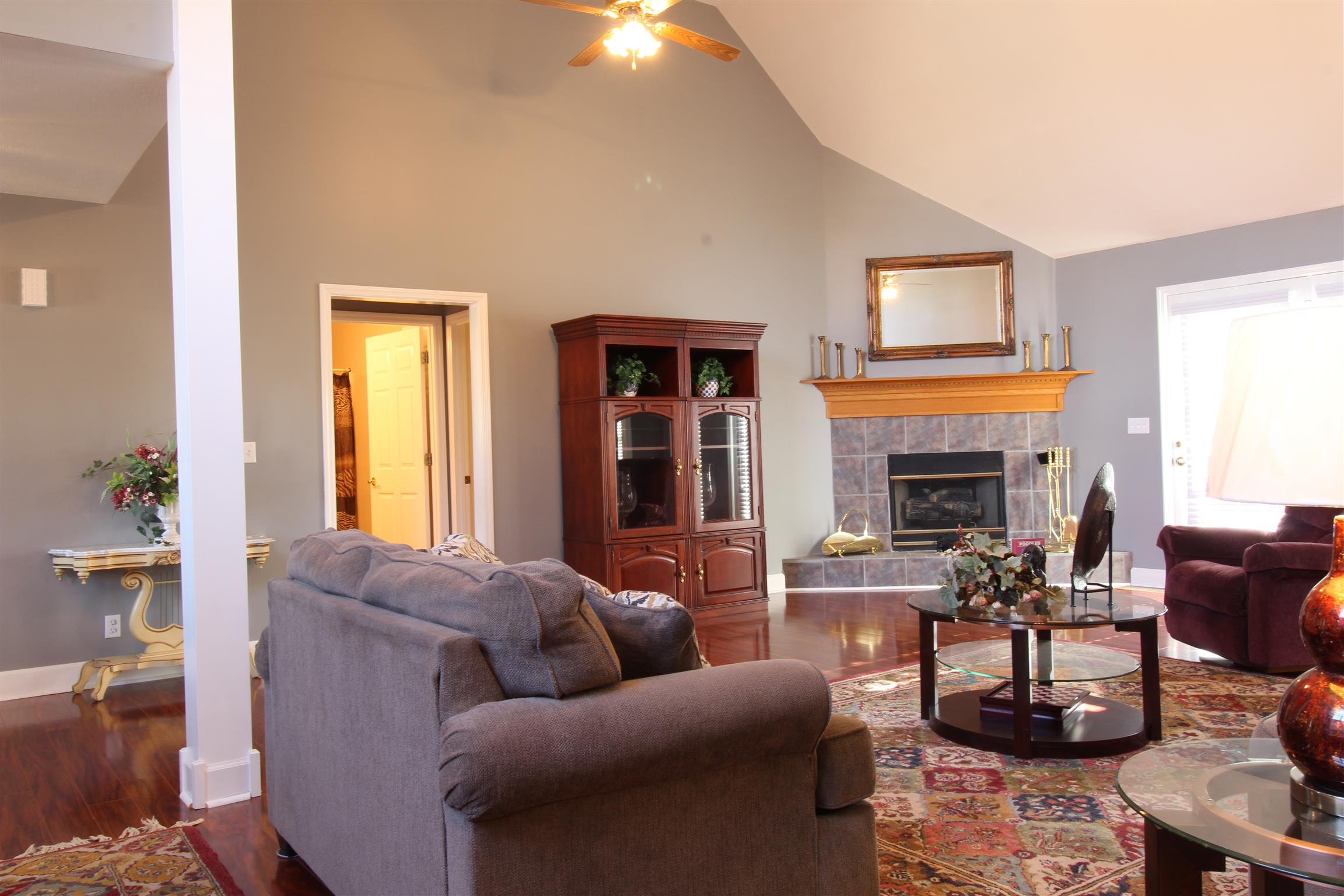 176 Simons Boulevard Morrison, TN 37357 - Photo 2 of 21 a living room with furniture fireplace and a table