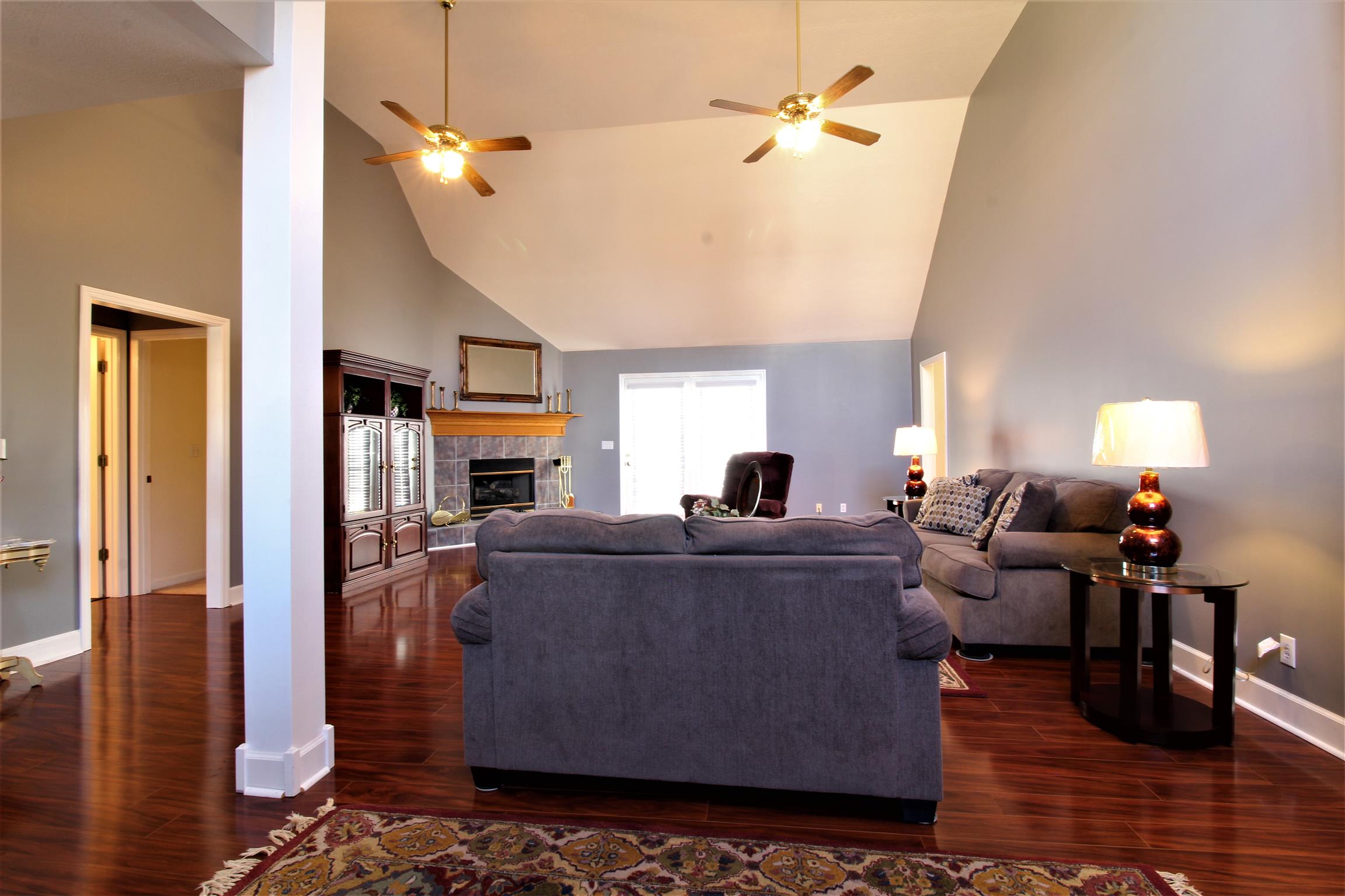 176 Simons Boulevard Morrison, TN 37357 - Photo 4 of 21 a living room with furniture and a fireplace