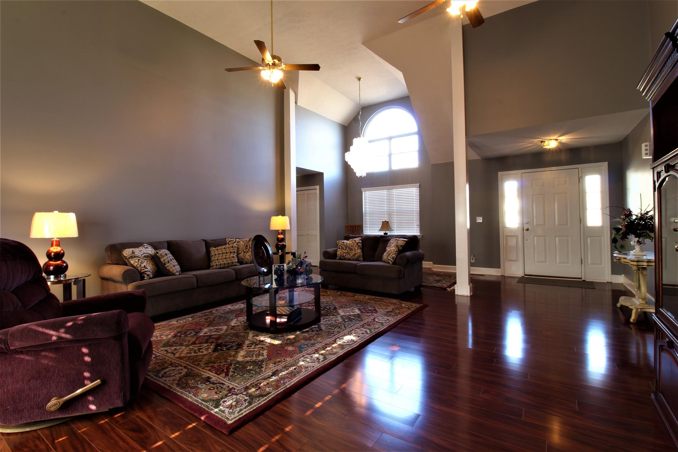176 Simons Boulevard Morrison, TN 37357 - Photo 6 of 21 a living room with lots of furniture and a chandelier