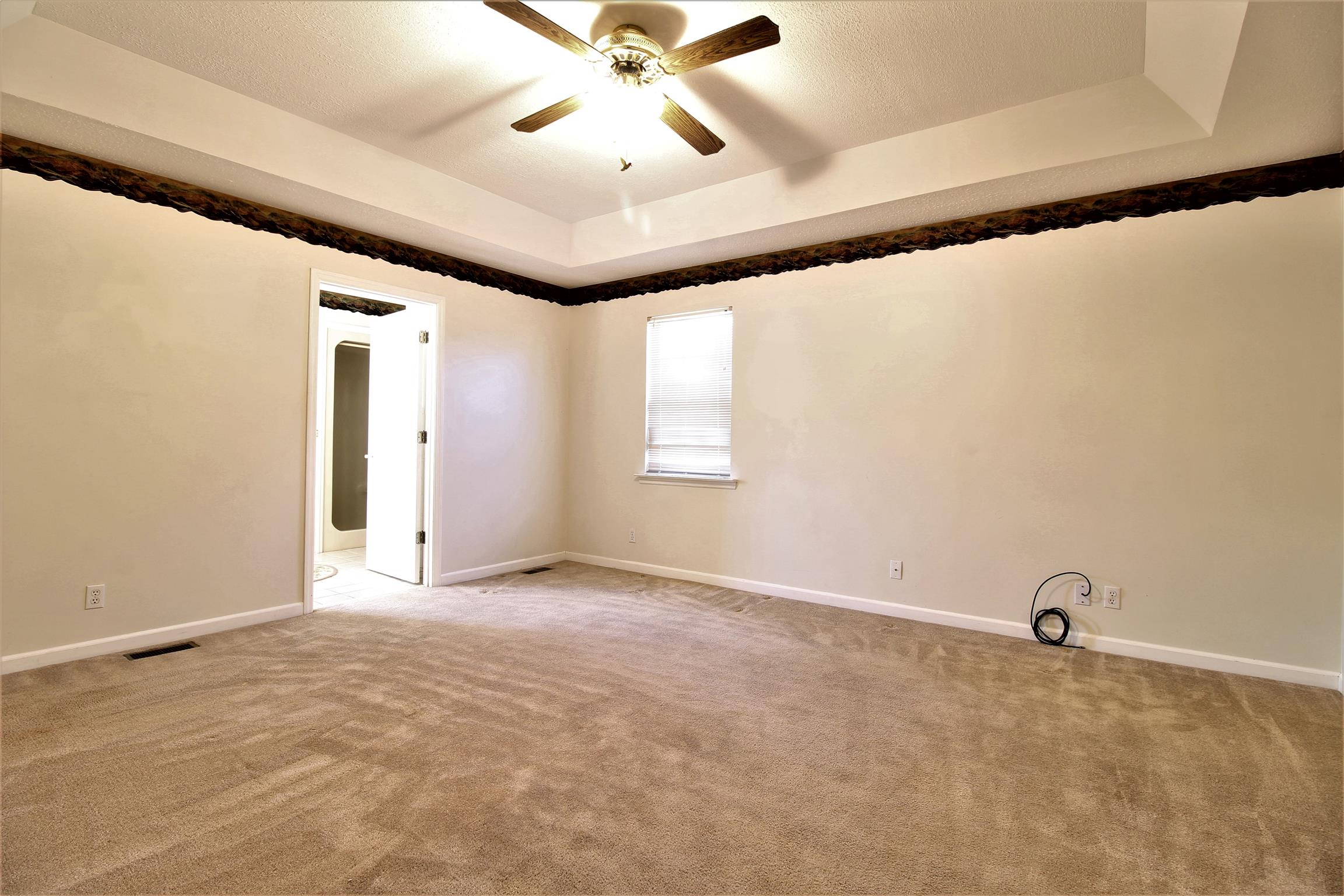 176 Simons Boulevard Morrison, TN 37357 - Photo 10 of 21 an empty room with windows and fan