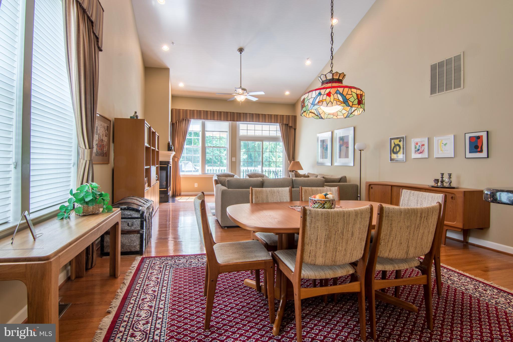 8427 Meadowsweet Road Baltimore, MD 21208 - Photo 13 of 30 DINING ROOM & LIVING ROOM W/ WOOD FLOORS